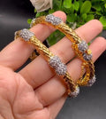 Gold toned kangan pair